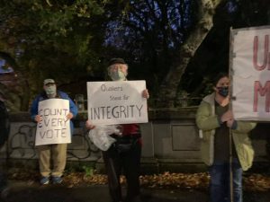 Quakers hold signs calling for election integrity at Seattle Peace Park November 2020